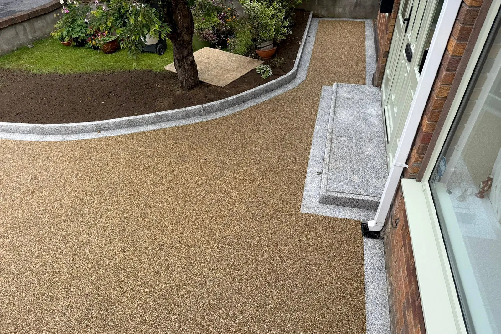 Silver granite step installed alongside resin driveway in Templeroan Dublin